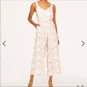 Pink/cream snakeskin print jumpsuit with belted waist